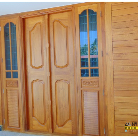 latest homes style wooden kerala door designs